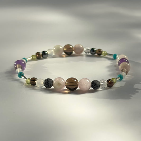 Beaded bracelet in shades of grey green and pink