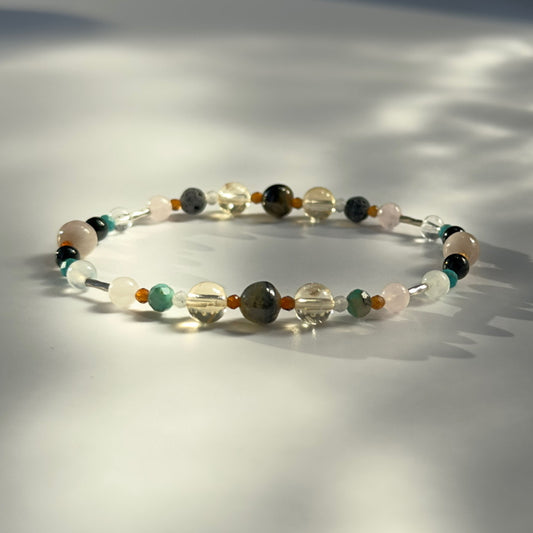 Beaded bracelet in shades of brown yellow and green