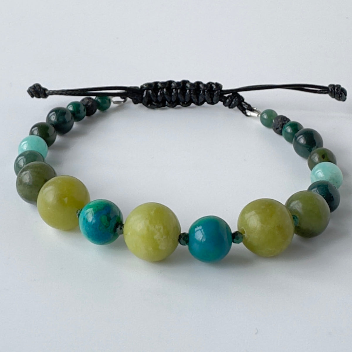 Multicolored beaded bracelet on a white background