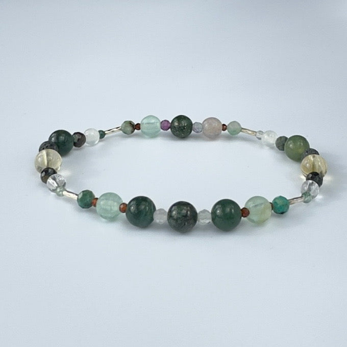 Beaded bracelet in tones of green grey and brown