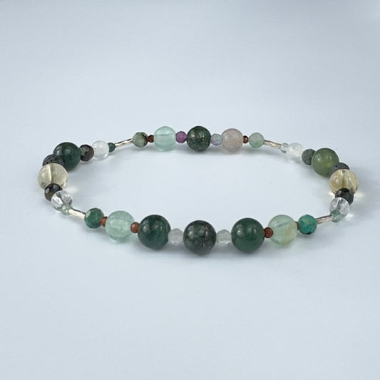 Beaded bracelet in tones of green grey and brown